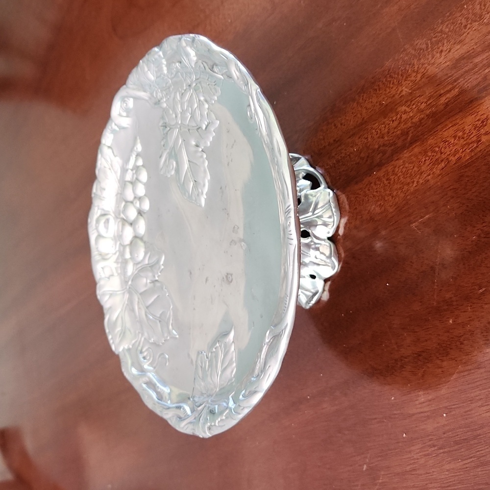 Arthur Court footed serving plate in Grapevine pattern.